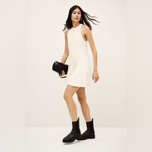 White ribbed-knit A-line mini dress.